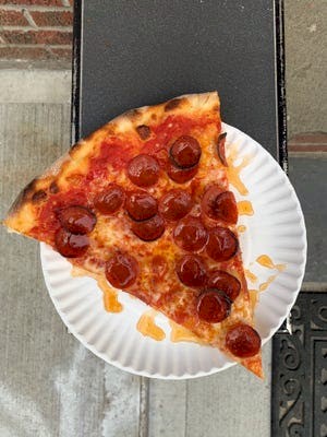 Hellboy Pizza slice with pepperoni